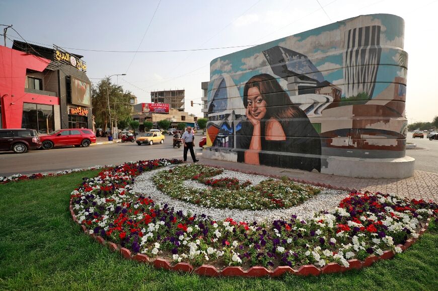 A mural of Iraqi architect Zaha Hadid, painted by Iraqi artist Wijdan al-Majed -- part of an initiative aiming to 'bring beauty to the city' of Baghdad
