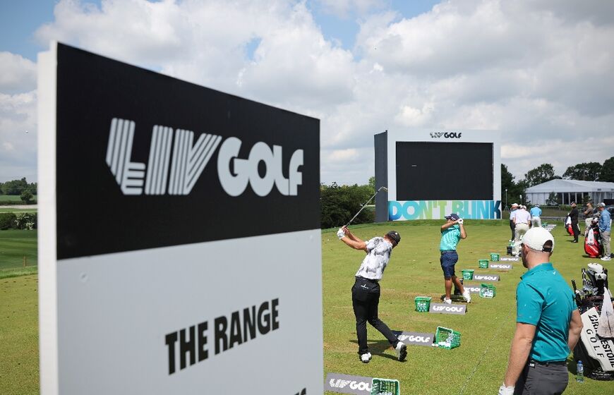 Players practise on the driving range at the Centurion Club, on the outskirts of London       