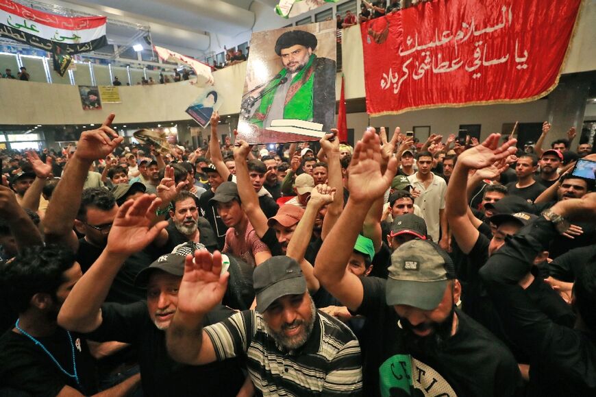 Supporters of Iraqi cleric Moqtada Sadr take part in a mourning ritual amid the Shiite Muslim Ashura commemoration period as they occupy Iraq's parliament