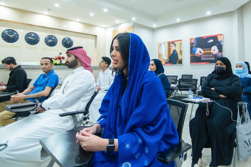 Students attend a training seminar at the tourism ministry in the Saudi capital Riyadh