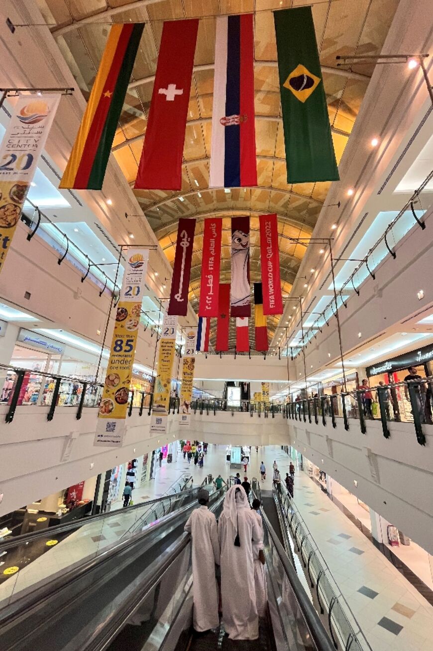 A Qatar shopping mall with flags of countries taking part in the 2022 FIFA World Cup 