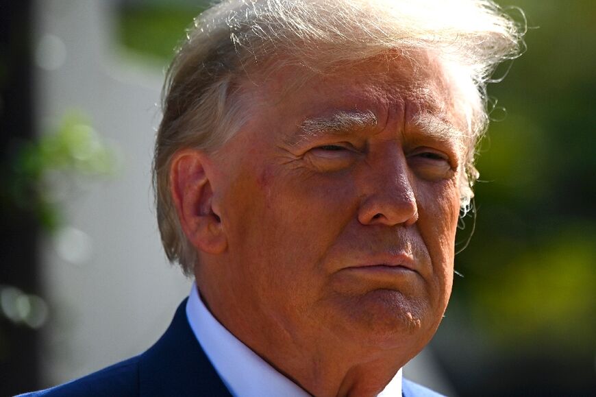 Former US president Donald Trump speaks to the media after voting in the US midterm elections in Palm Beach, Florida, on November 8, 2022