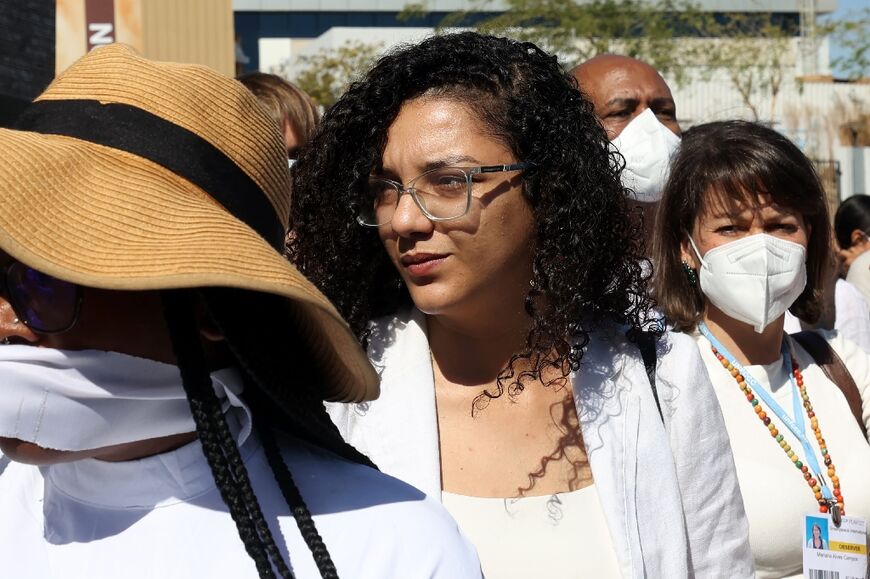 Egyptian Sanaa Seif (C), the sister of imprisoned British-Egyptian activist Alaa Abdel Fattah, attends a protest by Women and Gender Constituency (WGC) during the COP27 climate conference at the Sharm el-Sheikh International Convention Centre