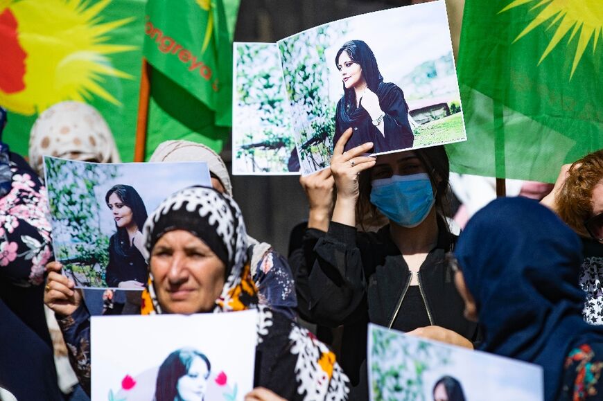 Syrian Kurds rally on September 25, 2022 to mourn 22-year-old Iranian Kurdish woman Mahsa Amini who died in the custody of Iranian authorities