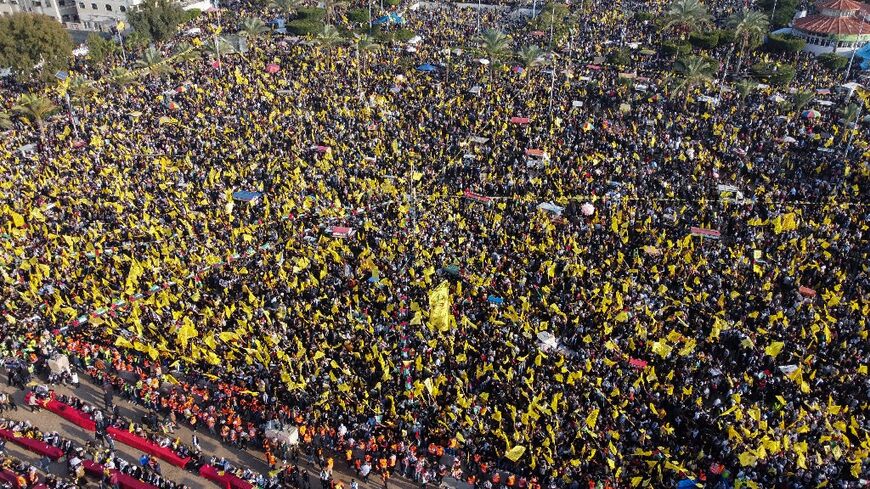 Fatah supporters turn Gaza City's Al-Katiba square into a sea of yellow