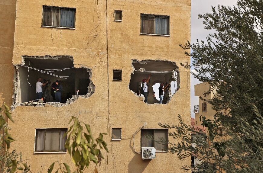 When Israeli forces demolish one apartment within a block, they knock down the walls to make it uninhabitable, as in this building in Jenin, the occupied West Bank