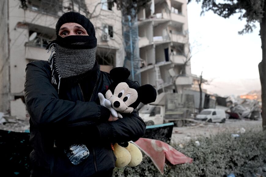 Missing children's toys scatter debris-strewn streets of Turkey's southeast