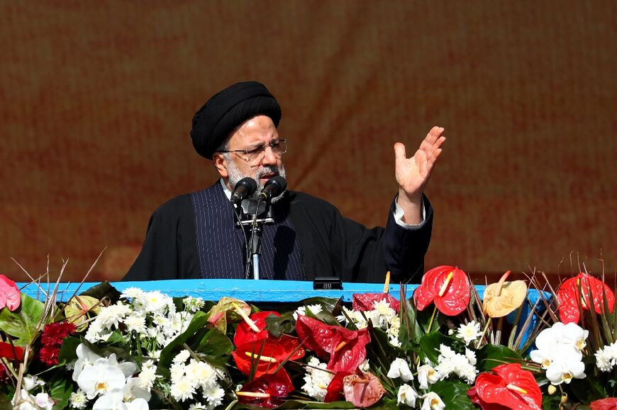 President Ibrahim Raisi addresses the crowds gathered in Tehran's Azadi Square