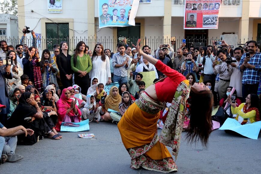 Aurat (Women) March activists rally to mark the International Women's Day in Multan, Pakistan on March 8, 2023, joining thousands across the conservative country despite efforts by police in some areas to stem the divisive protests