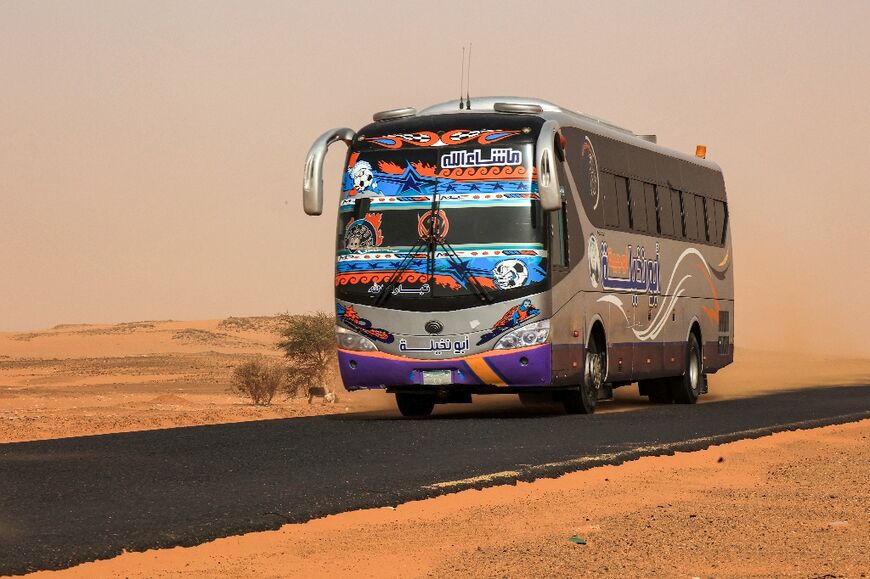 A passenger bus at al-Gabolab in Sudan's Northern State, northwest of Khartoum