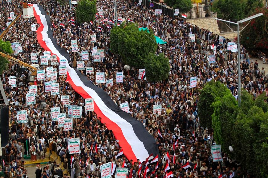 Supporters of Yemen's Huthi rebels marked the eighth anniversary of the Saudi-led intervention in their country, in Sanaa on March 26, 2023 