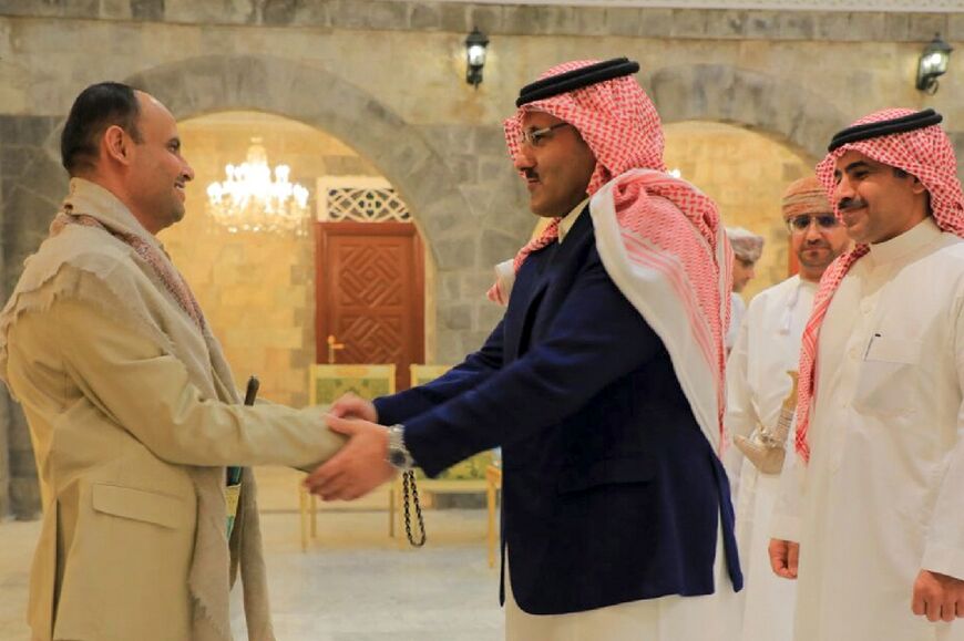The Huthi group's political leader Mahdi al-Mashat (L) welcomed the Saudi ambassador to Yemen, Mohammed Al Jaber and a delegation for talks in Sanaa, Yemen's rebel-held capital