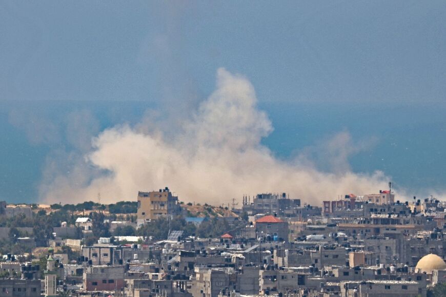 Smoke billows over the Gaza Strip town of Rafah following an Israeli air strike