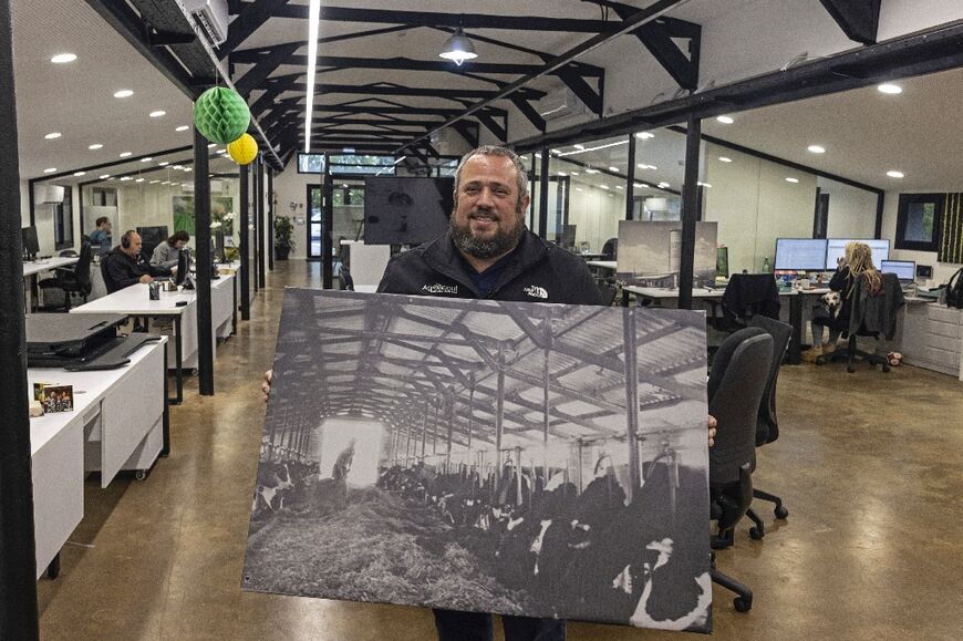 Simcha Shore, founder and head of the agronomy tech company AgroScout, poses in the old barn of the Yiron kibbutz which now serves as the headquarters of his company