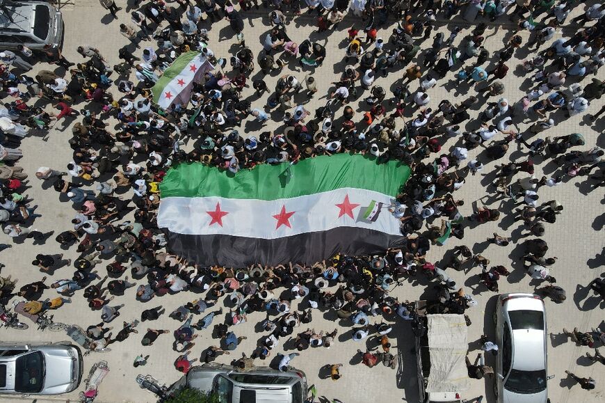 Syrians angry at Assad's rehabiliation protest in the rebel-held city of Afrin