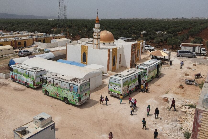 Children In Quake-hit Syria Learn In Buses Turned Classrooms - Al ...