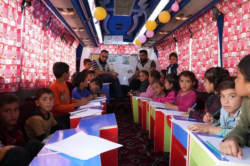 Children In Quake-hit Syria Learn In Buses Turned Classrooms - Al ...