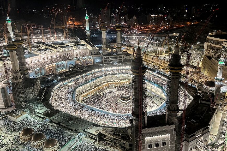 Huge crowds of pilgrims throng the Grand Mosque in Mecca, Islam's holiest site, as the biggest hajj in years gets under way in the searing Saudi Arabian heat