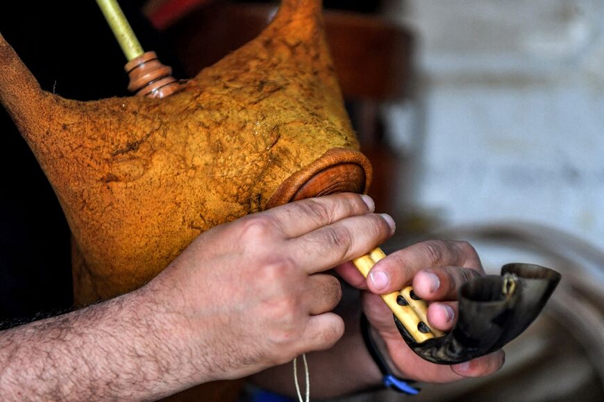 The traditional mizwad is made from cow horns, pieces of river reed, and a goatskin bag