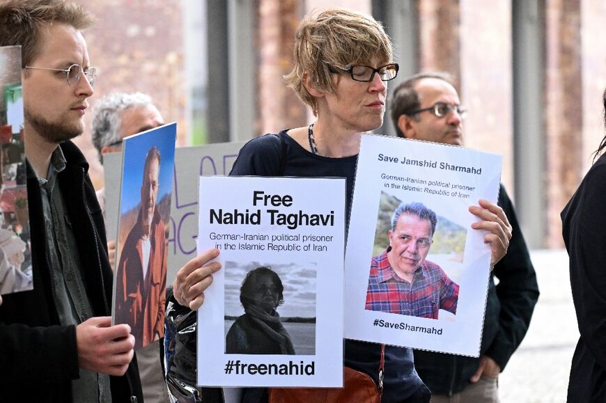 Around 20 people gathered outside the German foreign ministry in Berlin on Monday afternoon to mark three years since Iran announced Sharmahd's capture