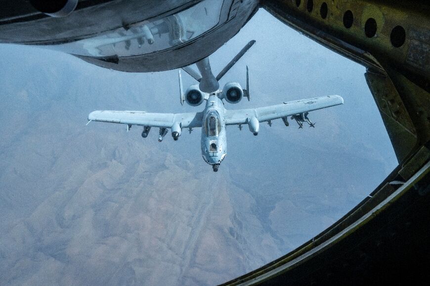 An A-10 warplane from the United States Air Force 75th Expeditionary Fighter Squadron receives fuel from a KC-135 Stratotanker above the Strait of Hormuz