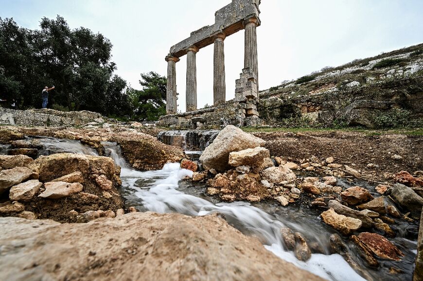 Wastewater flows through the ruins at the site of the ancient Greco-Roman city of Cyrene