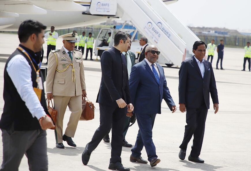 Comoros President and AU chairperson Azali Assoumani (2R) arrives for the G20 summit in New Delhi on September 8, 2023