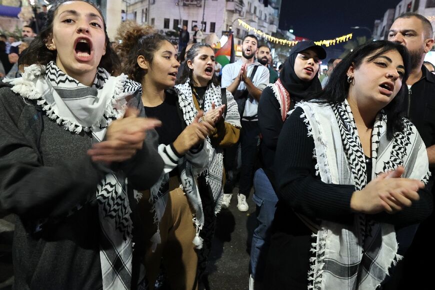 Palestinians rally in Ramallah in the occupied West Bank on October 10, 2023 to express their support for Gaza amid the Israeli bombardment and siege