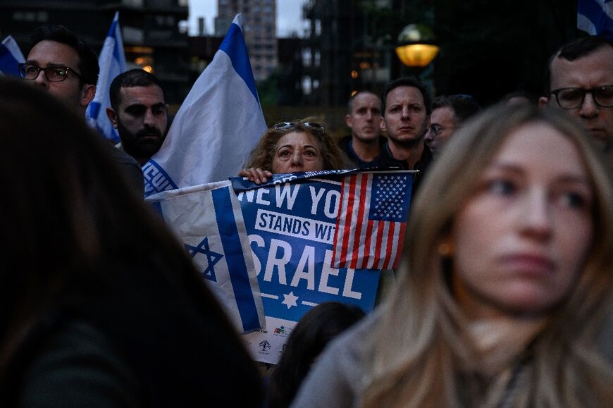 People attend a "Stand with Israel" vigil and rally in New York City on October 10, 2023