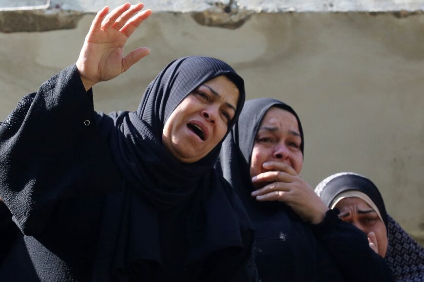 Relatives bid farewell to Mohammed Fayed, one of three Palestinians killed by Israeli fire in Jenin in the latest violence in the occupied West Bank