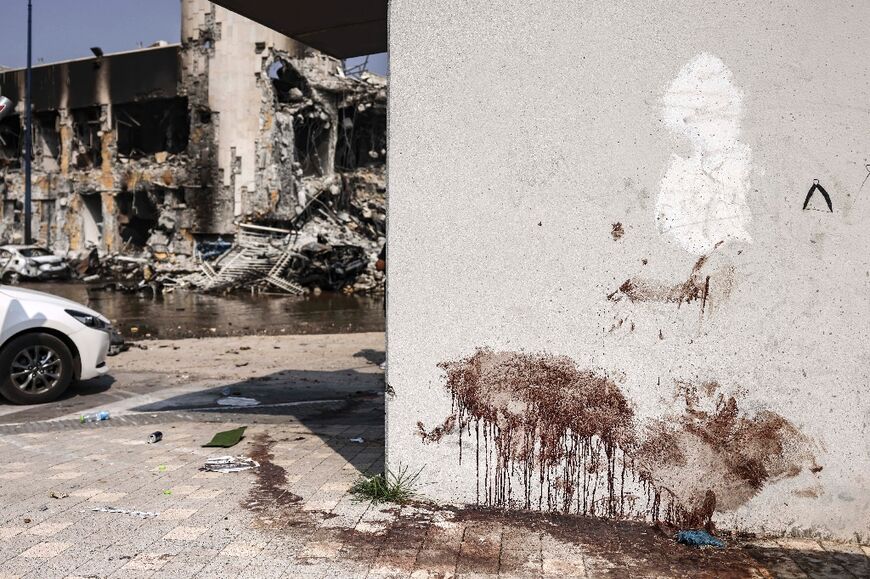 Blood stains a wall at an Israeli police station in Sderot after battles to dislodge Hamas militants 