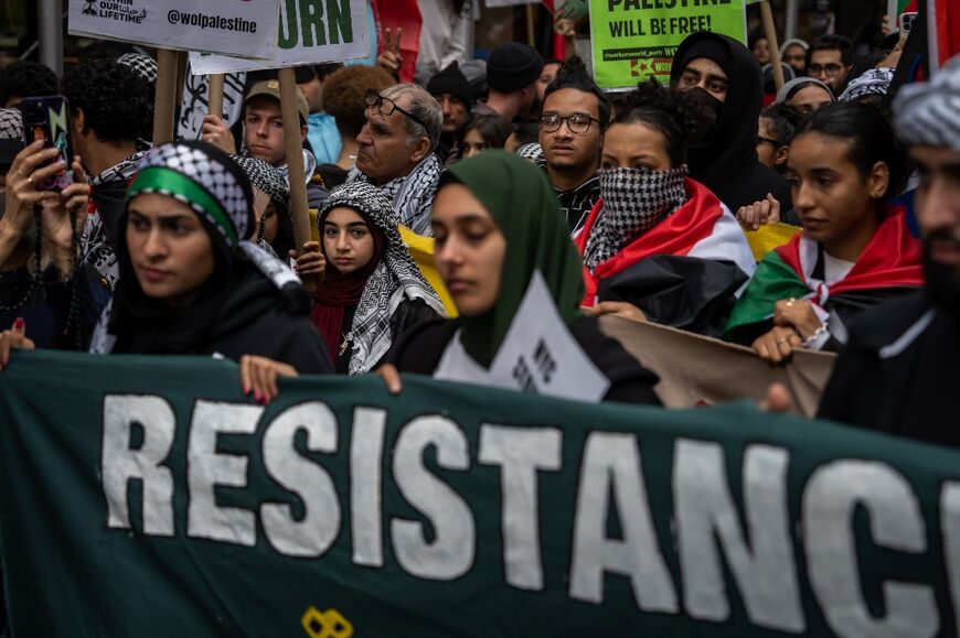 Demonstrators in support of Palestinians march during a protest in New York on October 9, 2023