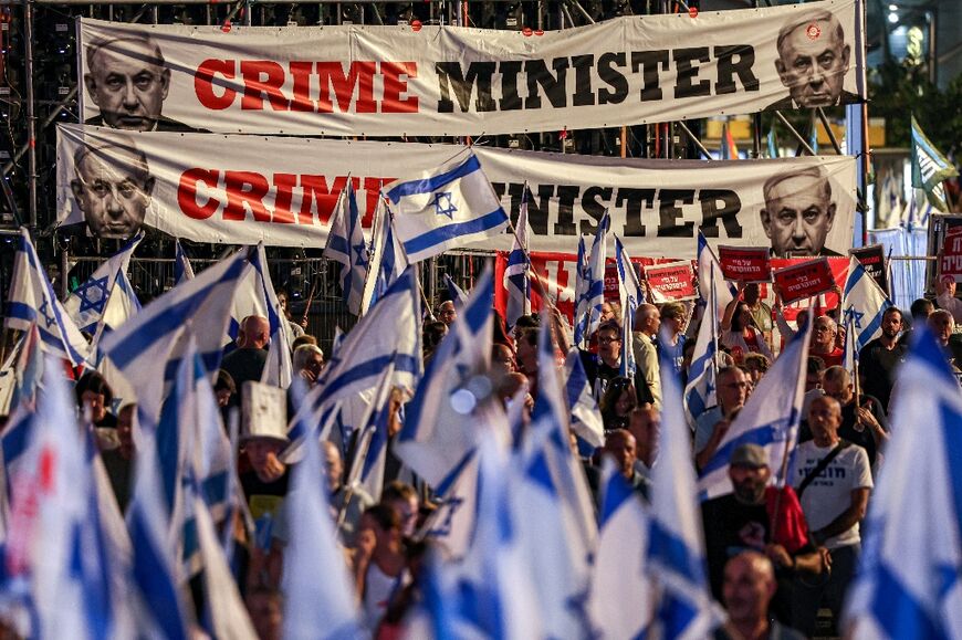 Demonstrators rally against the Israeli government's judicial overhaul plan in Tel Aviv on September 30, 2023