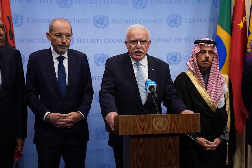 The foreign ministers of Jordan, the Palestinian Authority and Saudi Arabia speak to reporters outside the United Nations Security Council