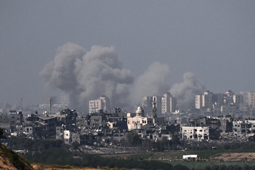 Smoke billows during an Israeli air strike on the northern Gaza Strip