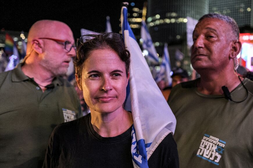 Bressler arrives with bodyguards at the weekly protest in Tel Aviv on September 30, 2023