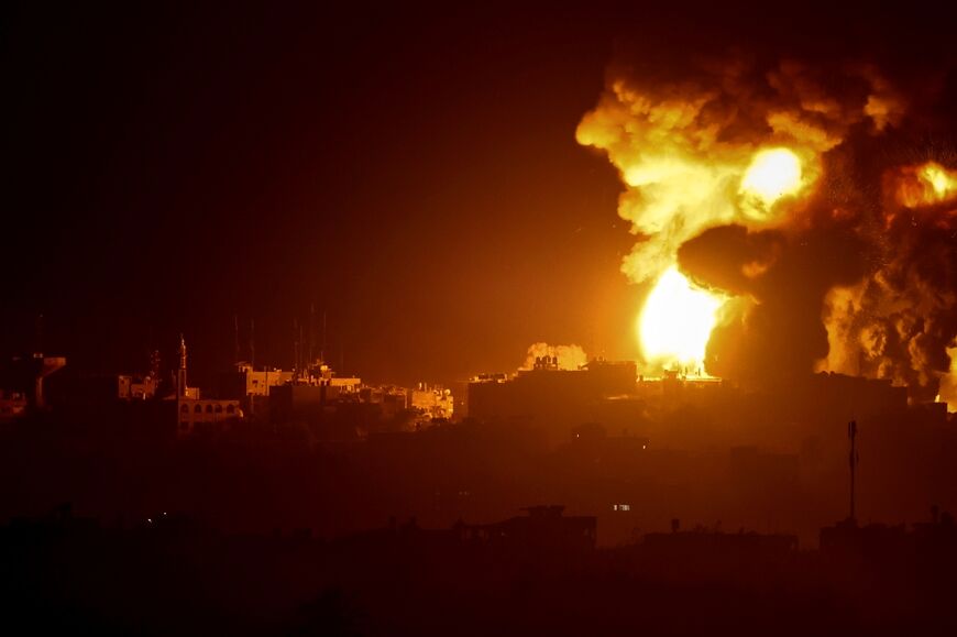 A fireball erupts in the Gaza Strip during Israeli bombardment, amid ongoing battles between Israel and the Palestinian Hamas movement