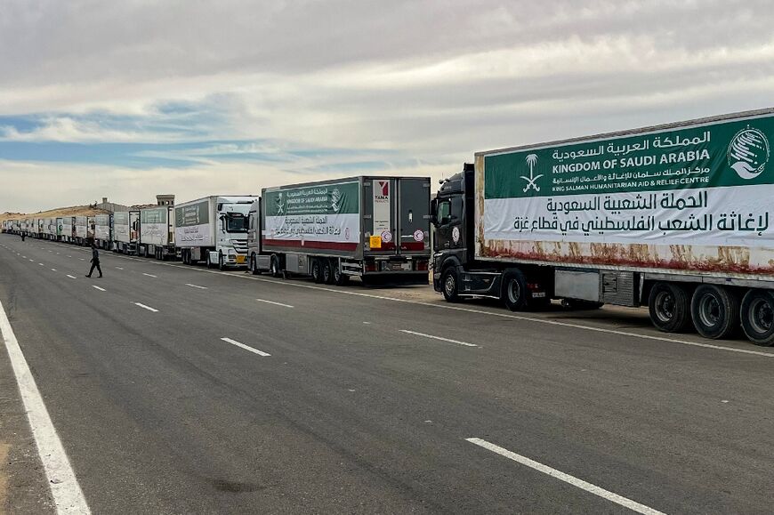 Trucks carrying Saudi aid to the Gaza Strip wait in El-Arish in Egypt, some 40 kilometres (25 miles) from the Rafah crossing with Gaza