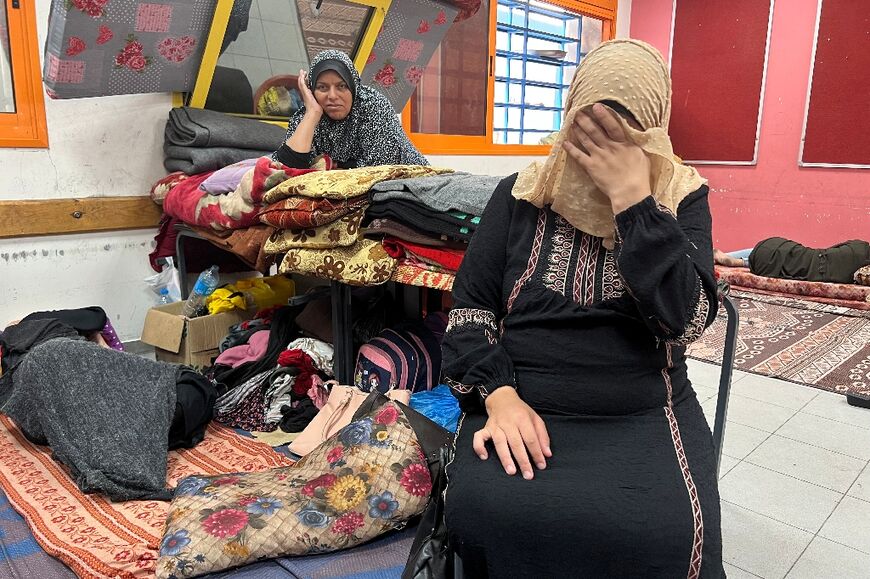 Umm Ibrahim Alayan, who is eight months pregnant, said 'I'm terrified, all I want to do is hold my baby in my arms. I feel I could lose the baby at any moment.'