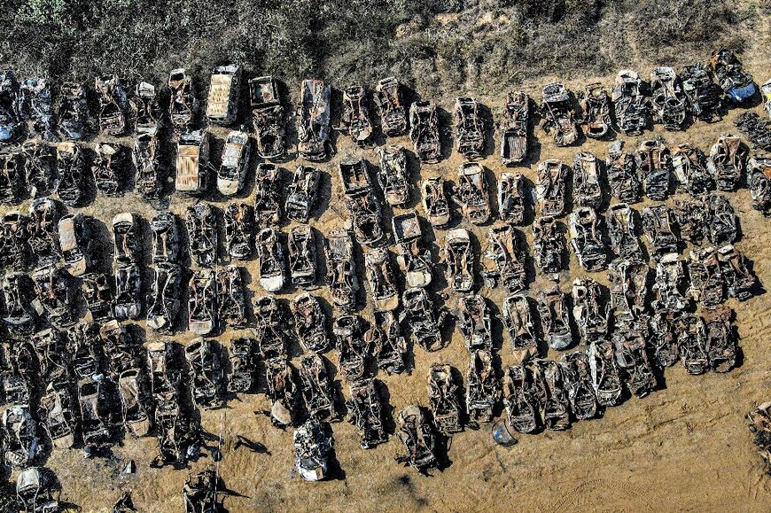 This aerial view shows some of the hundreds of Israeli vehicles that were destroyed in the October 7 attack carried out by Hamas militants from the Gaza Strip