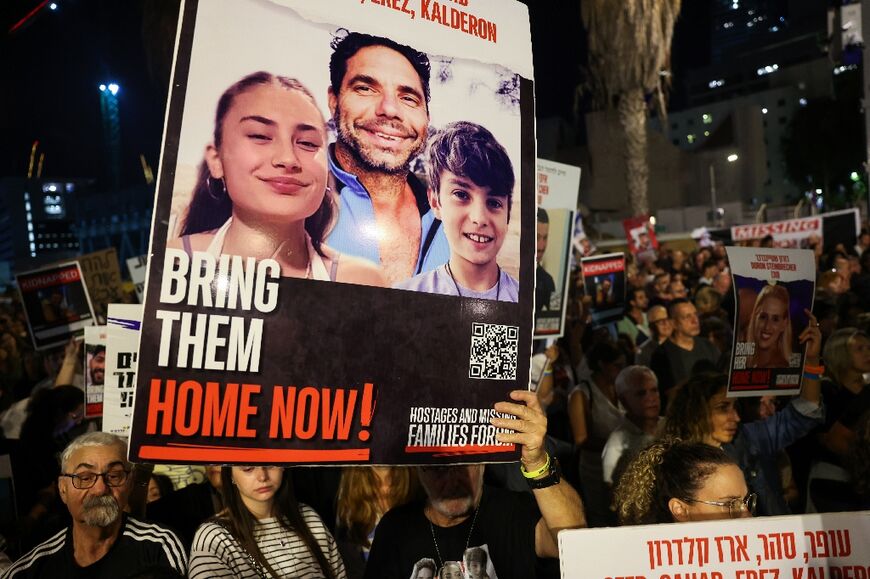 Protesters rally in Tel Aviv on November 18, 2023 to demand the release of Israelis held hostage in Gaza since the October 7 attack by Hamas militants