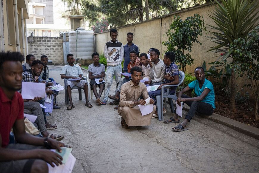 Ethiopian returnees, who are processed at an IOM transit centre in Addis Ababa, now face an uncertain future back home

gather in the courtyard of the International Organization for Migration (IOM) transit centre in Addis Ababa 