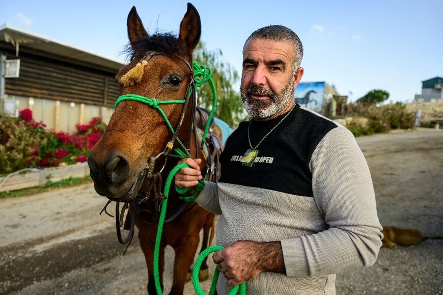 Druze Majdi Khatib, a former combat soldier who now runs a restaurant and a therapeutic horse farm, says he has served four months in prison for non-payment of building fines