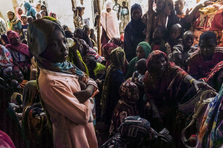 Civilians fleeing conflict in Sudan wait for asylum registration procedures at the United Nations High Commissioner in Renk, South Sudan 