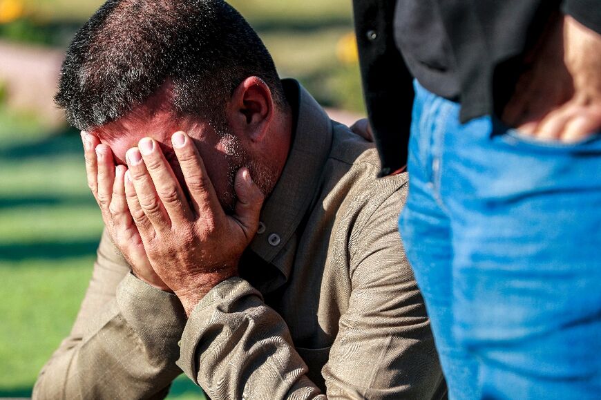 A mourner at the Baghdad funeral of the Kataeb Hezbollah member killed in the strike 