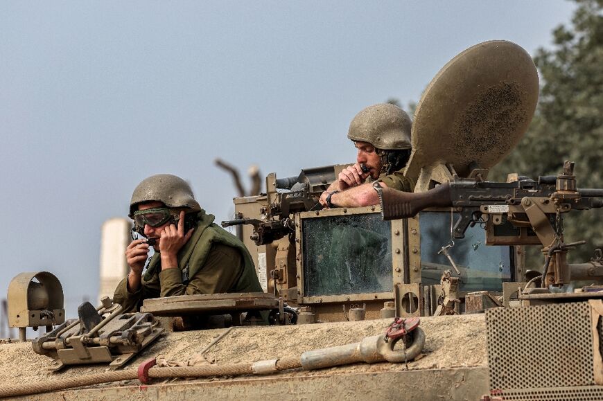 Israeli soldiers at a position along the border with the Gaza Strip