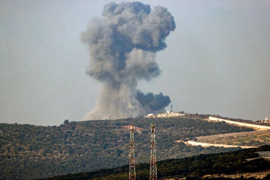 Smoke billowing following Israeli bombardment around the southern Lebanese village of Aita al-Shaab