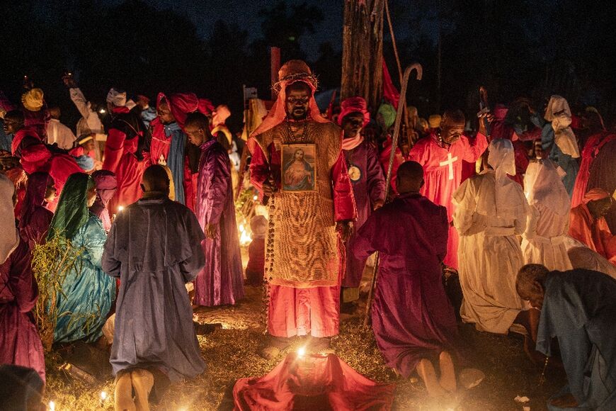 The faithful attended services around the globe, here with worshippers attending a mass near Ugunja in Kenya