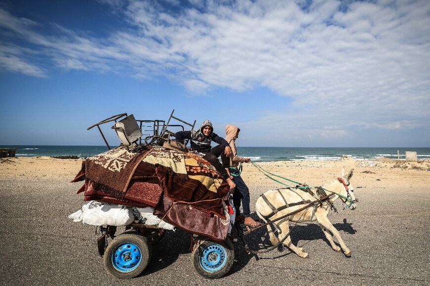 Palestinians fled Khan Yunis any way they could, including on donkey-drawn carts