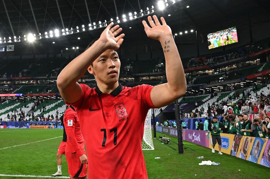 South Korea's  Hwang Hee-chan applauds the fans at the end of the game